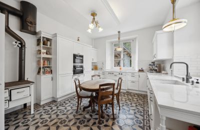 Villa storica in vendita Biel/Bienne, Alpenstrasse 95, Berna, Moderne trifft auf Nostalgie: Küche mit Guss-Holzofen